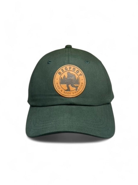 Bigfoot Hide & Seek World Champ Leather Patch Dad Hat